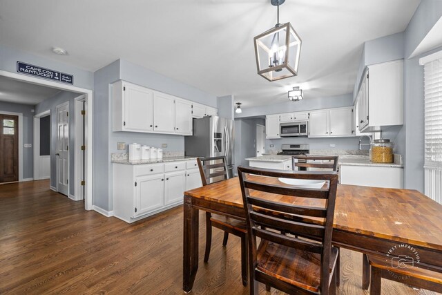322 Arlington Ave, Naperville, IL 60565 - dining room with dark wood-type flooring and baseboards