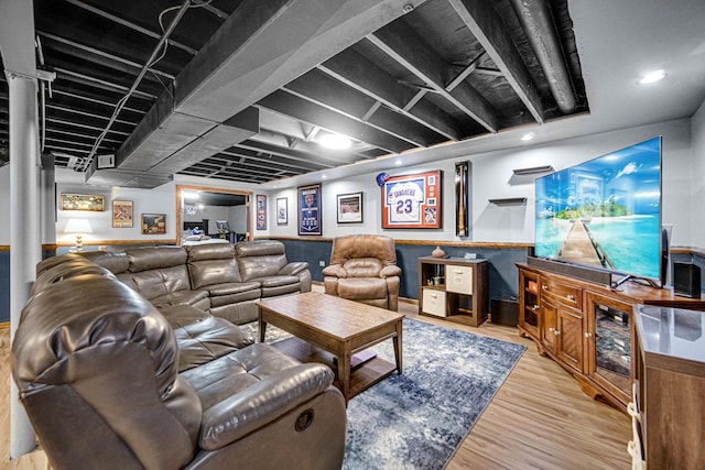 living room featuring wood finished floors and recessed lighting