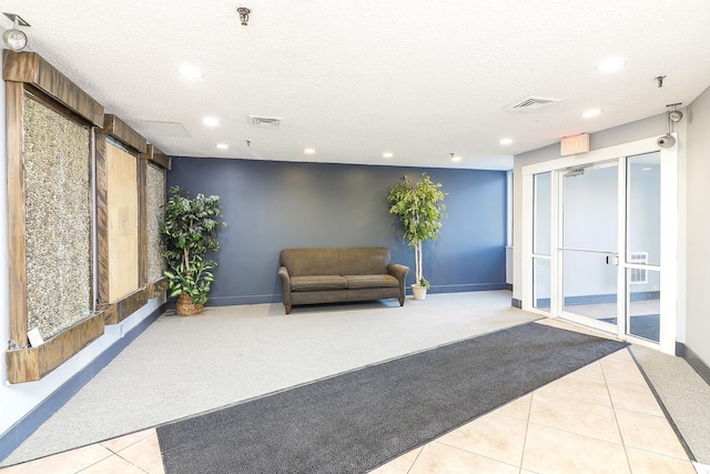 building lobby featuring visible vents