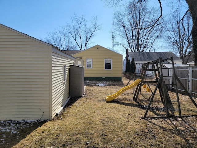 view of jungle gym with fence