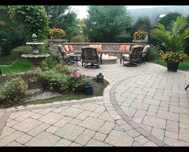 view of patio featuring a fire pit