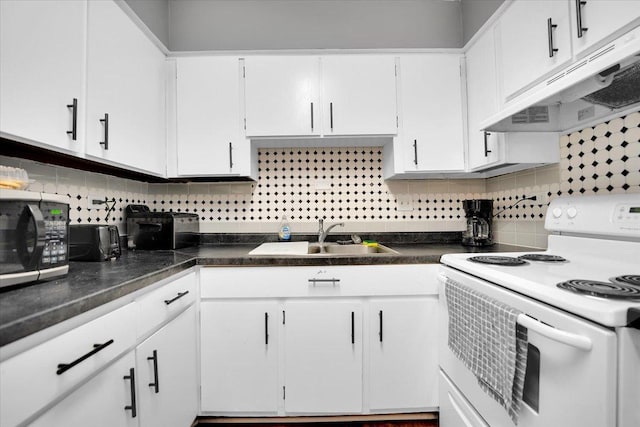 kitchen featuring white range with electric stovetop, white cabinetry, a sink, and under cabinet range hood