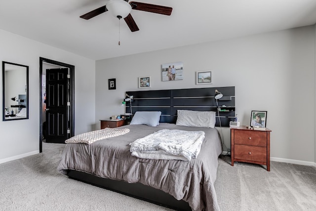 bedroom featuring carpet, baseboards, and ceiling fan