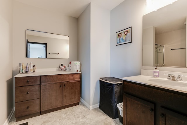 bathroom with vanity and baseboards