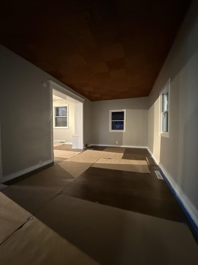 interior space featuring baseboards