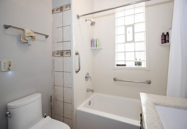 full bathroom with tub / shower combination, vanity, and toilet