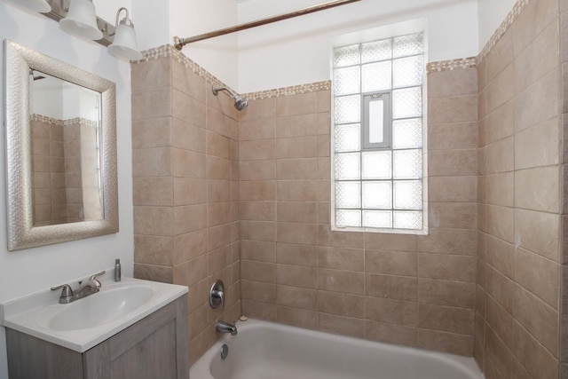 bathroom with plenty of natural light, vanity, and shower / tub combination