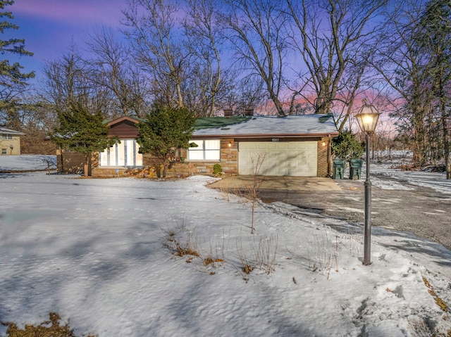 view of front of house featuring a garage and concrete driveway