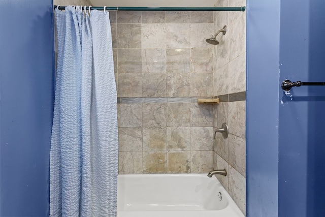 bathroom featuring shower / bath combo with shower curtain