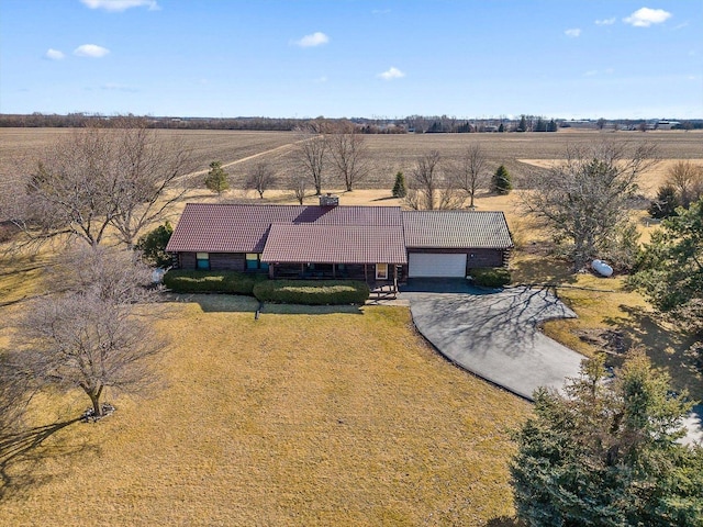 birds eye view of property featuring a rural view