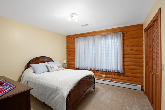 carpeted bedroom with a baseboard heating unit, a closet, visible vents, and log walls