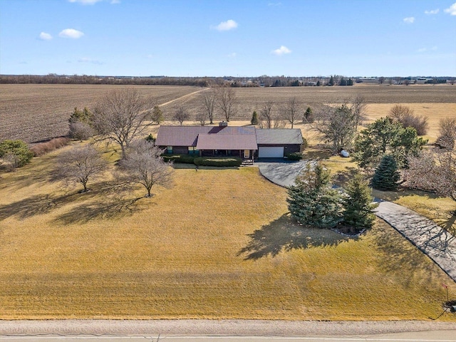 birds eye view of property featuring a rural view