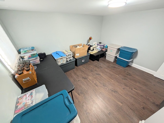 office with baseboards and dark wood-type flooring