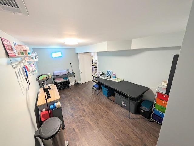 playroom with visible vents and dark wood-type flooring