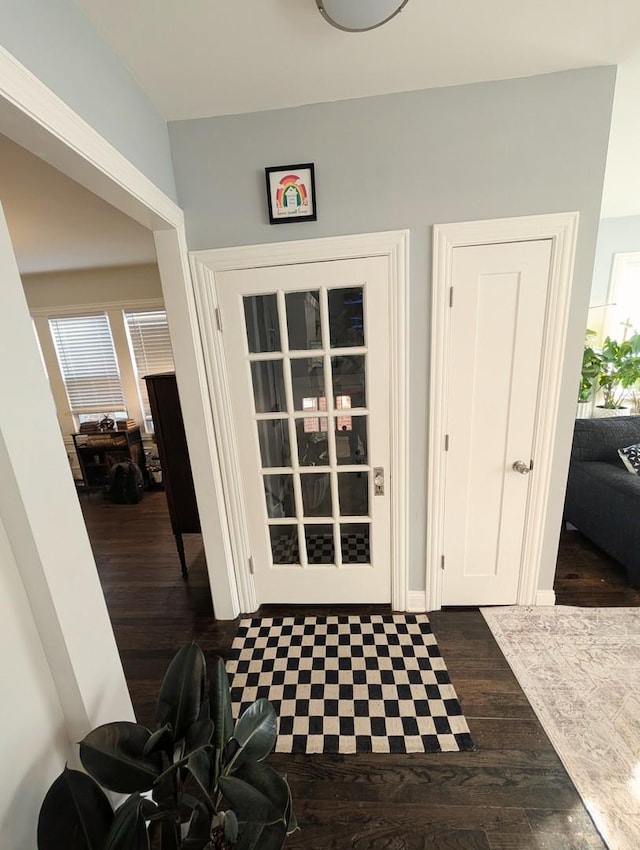 entrance foyer with dark wood-style flooring