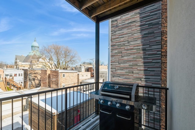 balcony featuring area for grilling