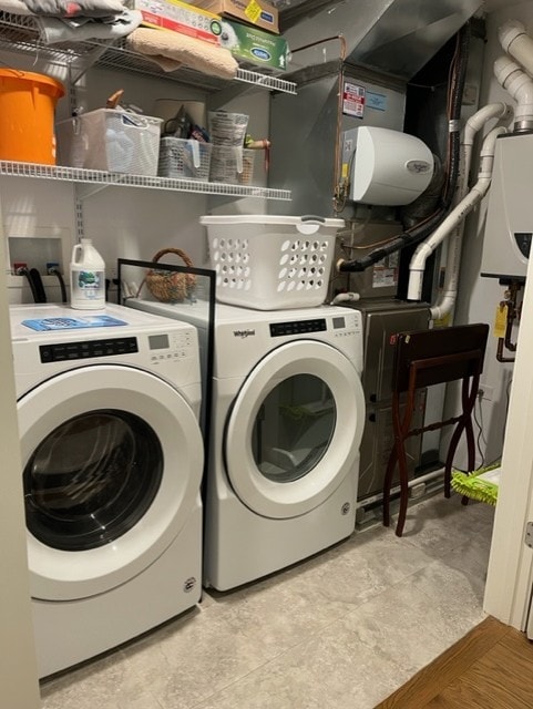 laundry room with laundry area and independent washer and dryer