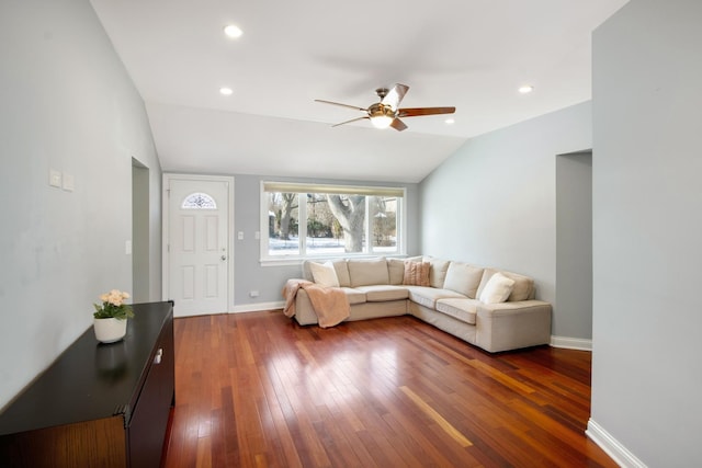 living room with baseboards, lofted ceiling, dark wood-style floors, ceiling fan, and recessed lighting