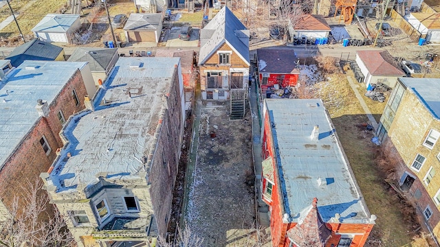 birds eye view of property with a residential view