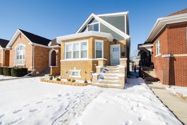 view of front of home with brick siding