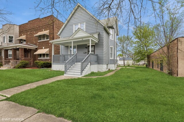 view of front facade with a porch and a front yard