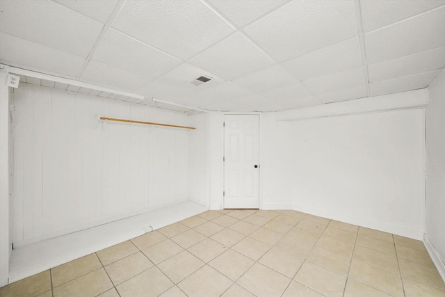 spare room with visible vents and a paneled ceiling