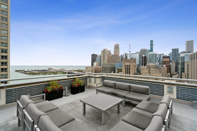 view of patio featuring a water view, a balcony, an outdoor living space, and a city view