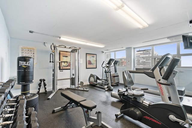 exercise room with baseboards