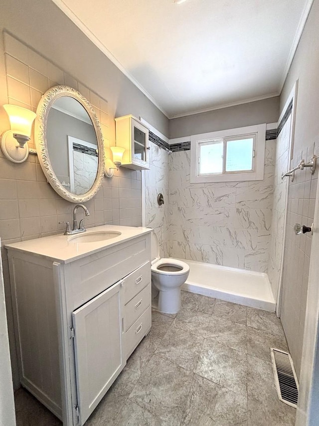 full bathroom with tile walls, visible vents, toilet, ornamental molding, and a shower stall