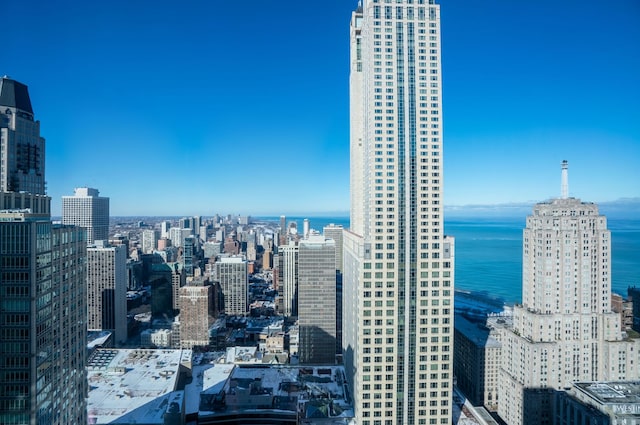 property's view of city featuring a water view