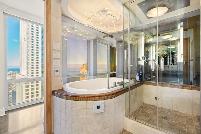 bathroom featuring a shower stall and a bath