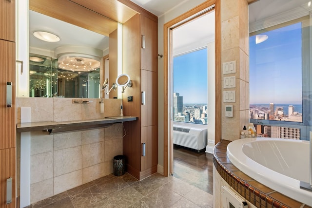 full bathroom featuring ensuite bath, a view of city, a bath, and vanity