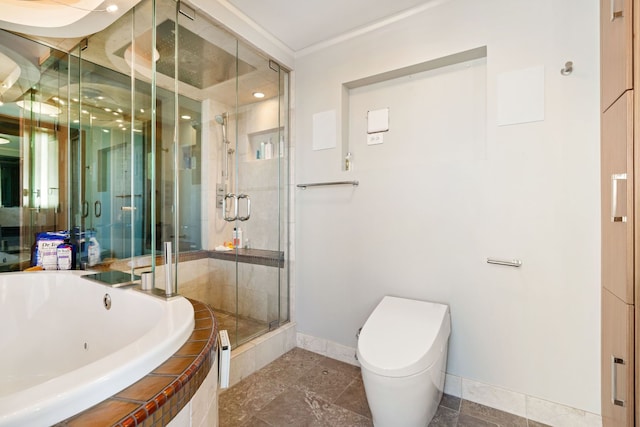 bathroom with a garden tub, a shower stall, toilet, and baseboards