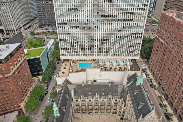 birds eye view of property with a city view