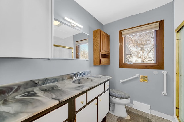 full bathroom with a shower with door, visible vents, toilet, vanity, and baseboards