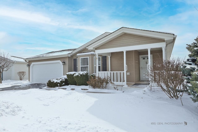 view of front of home featuring a garage and a porch