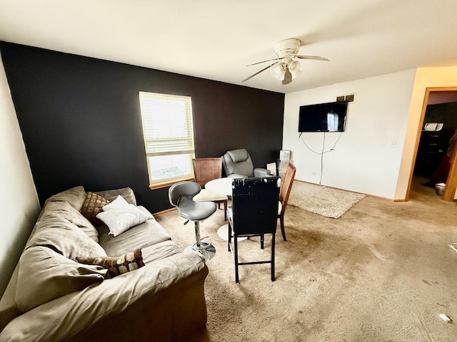 living room with carpet and ceiling fan