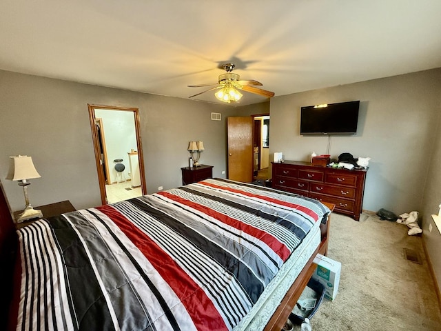 carpeted bedroom with ceiling fan and visible vents