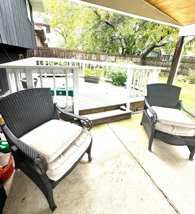 view of patio / terrace featuring a fenced backyard and a deck