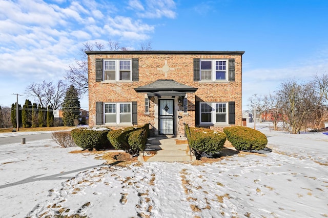 view of front of property featuring brick siding