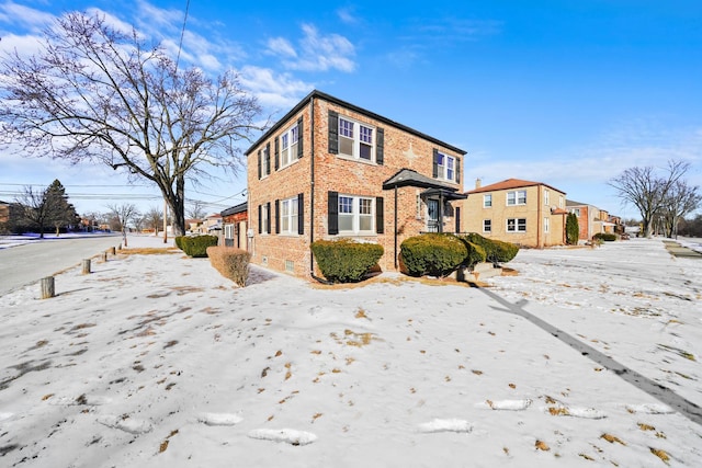 view of front of property with brick siding