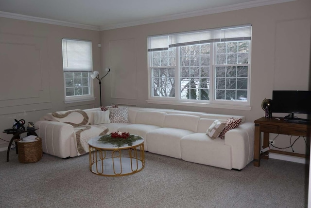 living area with carpet, crown molding, and a decorative wall