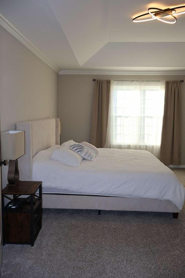 carpeted bedroom with crown molding