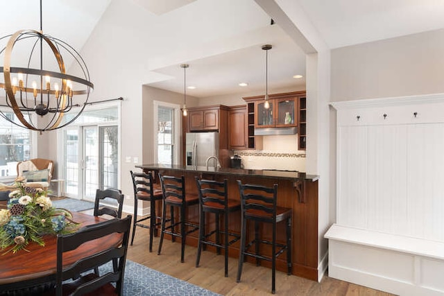 9 Cottage Grn, Ottawa, IL 61350 - dining area featuring recessed lighting, light wood-style floors, and a notable chandelier