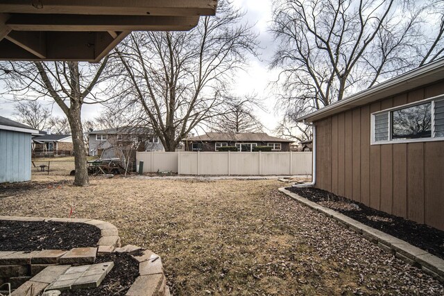 view of yard with fence