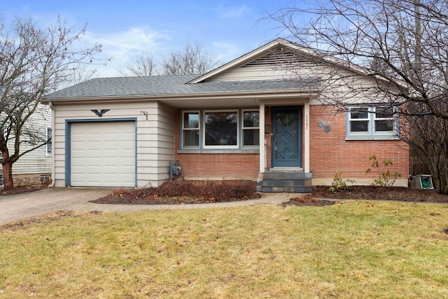 view of front of property with entry steps, concrete driveway, an attached garage, a front yard, and brick siding