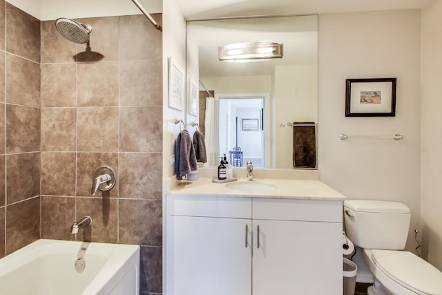 bathroom with vanity, toilet, and bathing tub / shower combination