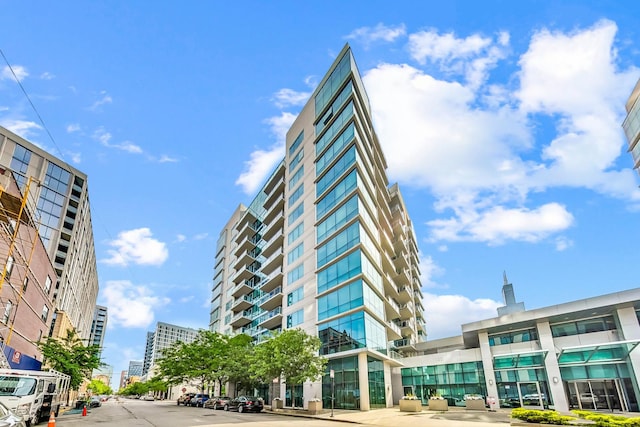 view of property with a city view