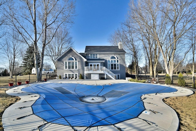 view of pool featuring a fenced in pool, fence, and a patio