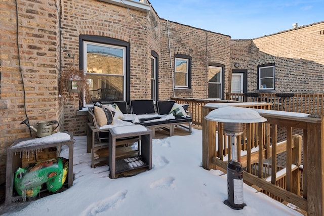 view of snow covered patio